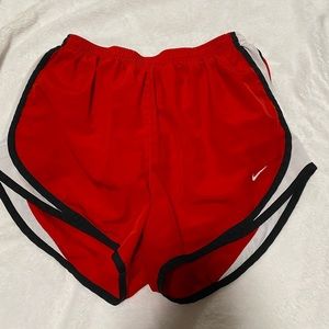 red nike shorts and blue old navy shorts.